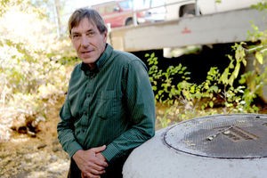Malcolm Alter, the stormwater engineer for the city of Flagstaff, stands in front of one of the undersized culverts along the Rio de Flag that a new watershed flood model is likely to identify as in need of enlarging. (Jake Bacon/Arizona Daily Sun)
